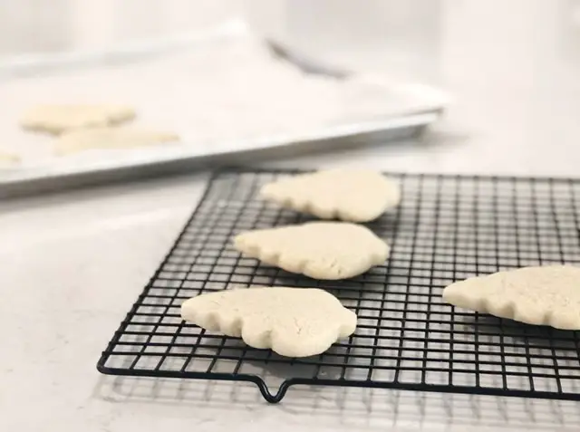 Christmas Tree Gluten Free sugar cookies cooling on rack