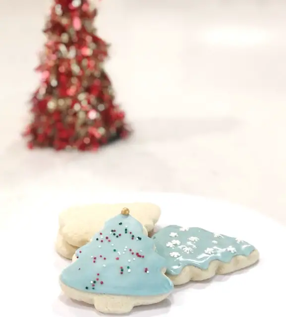 Christmas Tree sugar cookies on white plate