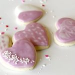 five gluten free heart shaped sugar cookies