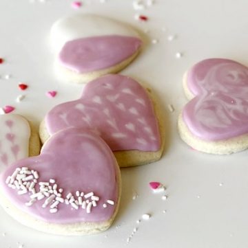 five gluten free heart shaped sugar cookies
