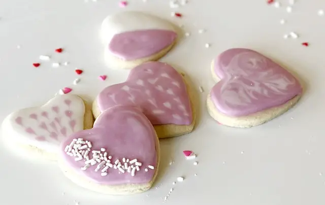 five gluten free heart shaped sugar cookies