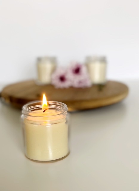 lit Organic Beeswax candle