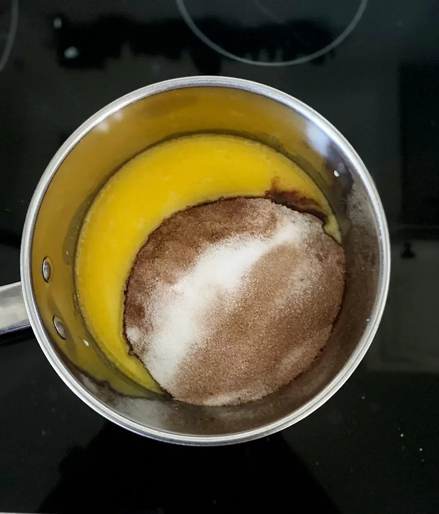 melted butter, sugar and cocoa in stainless steel pot 