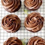 6 gluten-free chocolate zucchini cupcakes on cooling rack