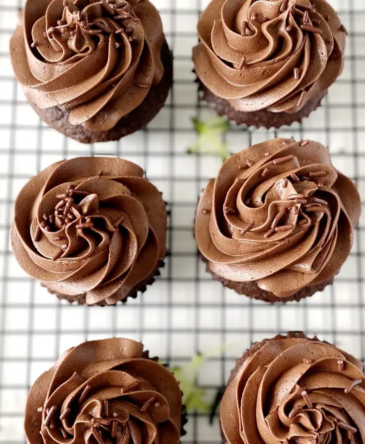 6 gluten-free chocolate zucchini cupcakes on cooling rack
